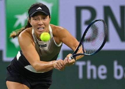 Mar 14, 2023; Indian Wells, CA, USA; Jessica Pegula (USA) hits a shot in her fourth round match against Petra Kvitova (CZE) in the BNP Paribas Open at the Indian Wells Tennis Garden. Mandatory Credit: Jayne Kamin-Oncea-USA TODAY Sports
