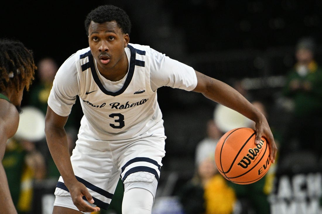 Mar 7, 2023; Sioux Falls, SD, USA;  Oral Roberts Golden Eagles guard Max Abmas (3) dribbles against the North Dakota State Bison in the second half at Denny Sanford Premier Center. Mandatory Credit: Steven Branscombe-USA TODAY Sports