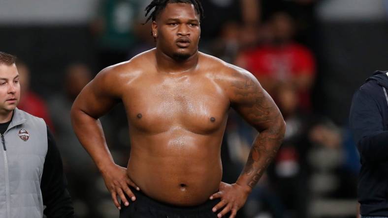 Georgia defensive lineman Jalen Carter (88) takes a break during UGA Pro Day in Athens, Ga., on Wednesday, March 15, 2023.

News Joshua L Jones