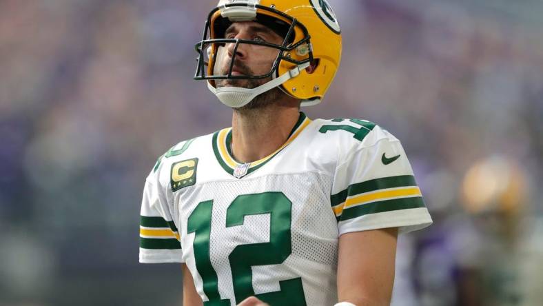 Green Bay Packers quarterback Aaron Rodgers (12) reacts after wide receiver Christian Watson (9) dropped a wide open long pass against the Minnesota Vikings on the first play from scrimmage during their football game Sunday, September 11, 2022, at U.S. Bank Stadium in Minneapolis, Min.

Mjs Apc Packvsvikings 0911220140djp 114193024