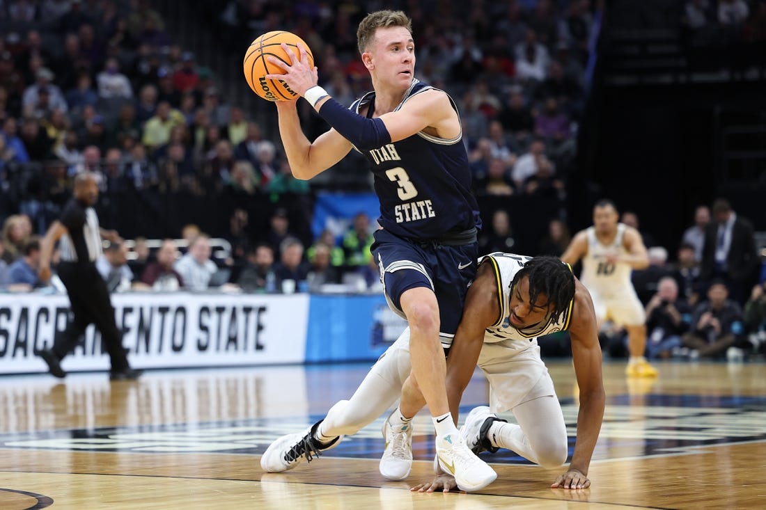 Mar 16, 2023; Sacramento, CA, USA; Utah State Aggies guard Steven Ashworth (3) moves the ball against Missouri Tigers forward Aidan Shaw (23) during the second half at Golden 1 Center. Mandatory Credit: Kelley L Cox-USA TODAY Sports