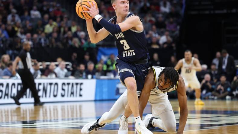 Mar 16, 2023; Sacramento, CA, USA; Utah State Aggies guard Steven Ashworth (3) moves the ball against Missouri Tigers forward Aidan Shaw (23) during the second half at Golden 1 Center. Mandatory Credit: Kelley L Cox-USA TODAY Sports