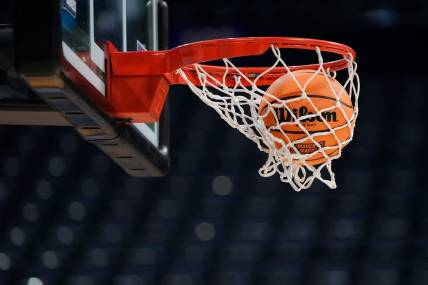 Mar 16, 2023; Columbus, Ohio, USA;  A ball falls through the net during a practice for the NCAA men   s basketball tournament at Nationwide Arena. Mandatory Credit: Adam Cairns-The Columbus Dispatch

Basketball Ncaa Men S Basketball Tournament