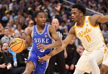 Mar 18, 2023; Orlando, FL, USA; Duke Blue Devils guard Jeremy Roach (3) dribbles against Tennessee Volunteers forward Tobe Awaka (11) during the first half in the second round of the 2023 NCAA Tournament at Legacy Arena. Mandatory Credit: Matt Pendleton-USA TODAY Sports