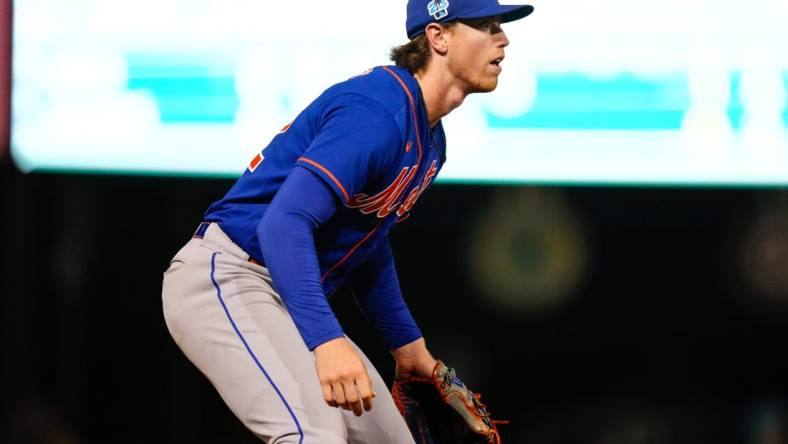 Mar 18, 2023; West Palm Beach, Florida, USA; New York Mets third baseman Brett Baty (22) watches a pitch against the Houston Astros during the seventh inning at The Ballpark of the Palm Beaches. Mandatory Credit: Rich Storry-USA TODAY Sports