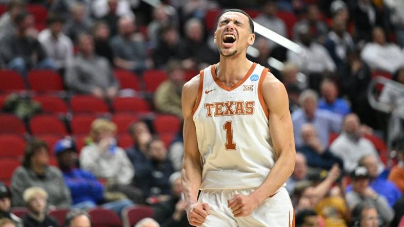 Mar 18, 2023; Des Moines, IA, USA; Texas Longhorns forward Dylan Disu (1) celebrates in the last seconds of a victory over the Penn State Nittany Lions at Wells Fargo Arena. Mandatory Credit: Jeffrey Becker-USA TODAY Sports