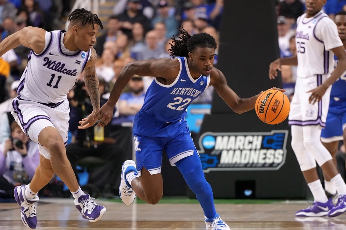 Mar 19, 2023; Greensboro, NC, USA;  Kentucky Wildcats guard Cason Wallace (22) drives to the basket against Kansas State Wildcats forward Keyontae Johnson (11) during the second half in the second round of the 2023 NCAA men   s basketball tournament at Greensboro Coliseum. Mandatory Credit: Bob Donnan-USA TODAY Sports