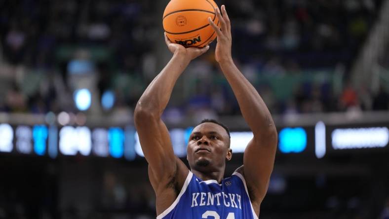 Mar 19, 2023; Greensboro, NC, USA;  Kentucky Wildcats forward Oscar Tshiebwe (34) shoots for the basket during the second half against the Kansas State Wildcats in the second round of the 2023 NCAA men   s basketball tournament at Greensboro Coliseum. Mandatory Credit: Bob Donnan-USA TODAY Sports