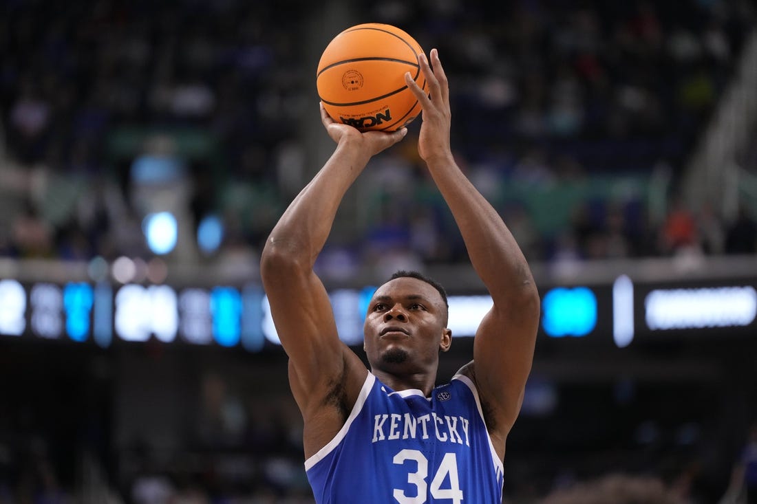 Mar 19, 2023; Greensboro, NC, USA;  Kentucky Wildcats forward Oscar Tshiebwe (34) shoots for the basket during the second half against the Kansas State Wildcats in the second round of the 2023 NCAA men   s basketball tournament at Greensboro Coliseum. Mandatory Credit: Bob Donnan-USA TODAY Sports