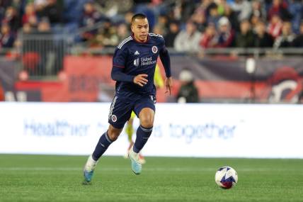 Mar 18, 2023; Foxborough, Massachusetts, USA; New England Revolution forward Bobby Wood (17) possesses the ball during the first half against the Nashville SC at Gillette Stadium. Mandatory Credit: Paul Rutherford-USA TODAY Sports