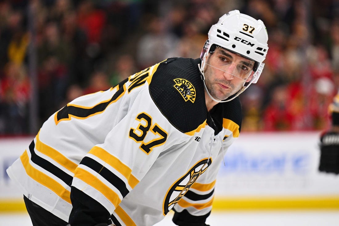 Mar 14, 2023; Chicago, Illinois, USA;  Boston Bruins forward Patrice Bergeron (37) skates against the Chicago Blackhawks at United Center. Mandatory Credit: Jamie Sabau-USA TODAY Sports