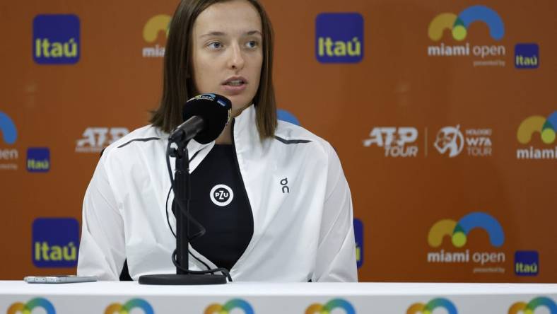 Mar 22, 2023; Miami, Florida, US; Iga Swiatek (POL) announces her withdrawal from the tournament at a press conference on day three of the Miami Open at Hard Rock Stadium. Mandatory Credit: Geoff Burke-USA TODAY Sports