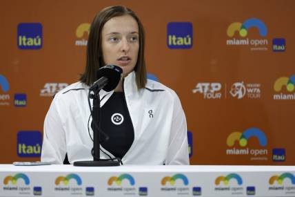 Mar 22, 2023; Miami, Florida, US; Iga Swiatek (POL) announces her withdrawal from the tournament at a press conference on day three of the Miami Open at Hard Rock Stadium. Mandatory Credit: Geoff Burke-USA TODAY Sports