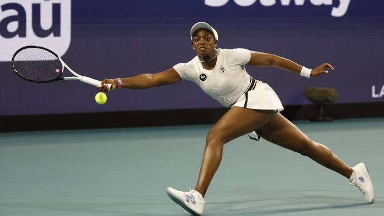 Mar 22, 2023; Miami, Florida, US; Sloane Stephens (USA) reaches for a forehand against Shelby Rogers (USA) (not pictured) on day three of the Miami Open at Hard Rock Stadium. Mandatory Credit: Geoff Burke-USA TODAY Sports