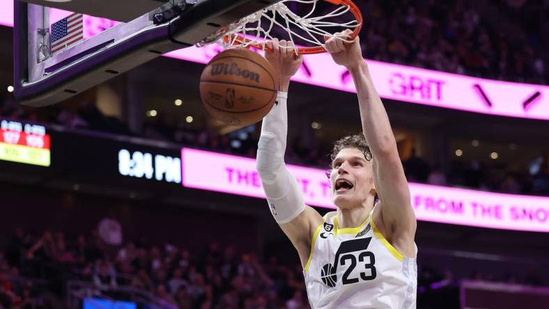 Mar 22, 2023; Salt Lake City, Utah, USA; Utah Jazz forward Lauri Markkanen (23) dunks the ball against the Portland Trail Blazers in the third quarter at Vivint Arena. Mandatory Credit: Rob Gray-USA TODAY Sports