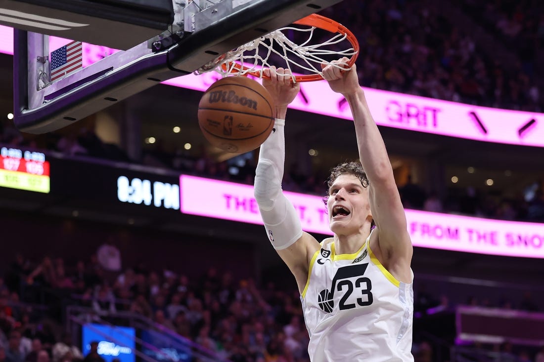 Mar 22, 2023; Salt Lake City, Utah, USA; Utah Jazz forward Lauri Markkanen (23) dunks the ball against the Portland Trail Blazers in the third quarter at Vivint Arena. Mandatory Credit: Rob Gray-USA TODAY Sports