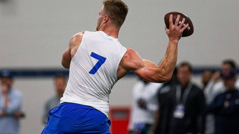 University of Kentucky senior quarterback Will Levis launched the ball downfield during a Pro Day workout at Nutter Field House in Lexington, Ky., on Friday, Mar. 24, 2023

Jf Uk Pro Day Aj4t0804