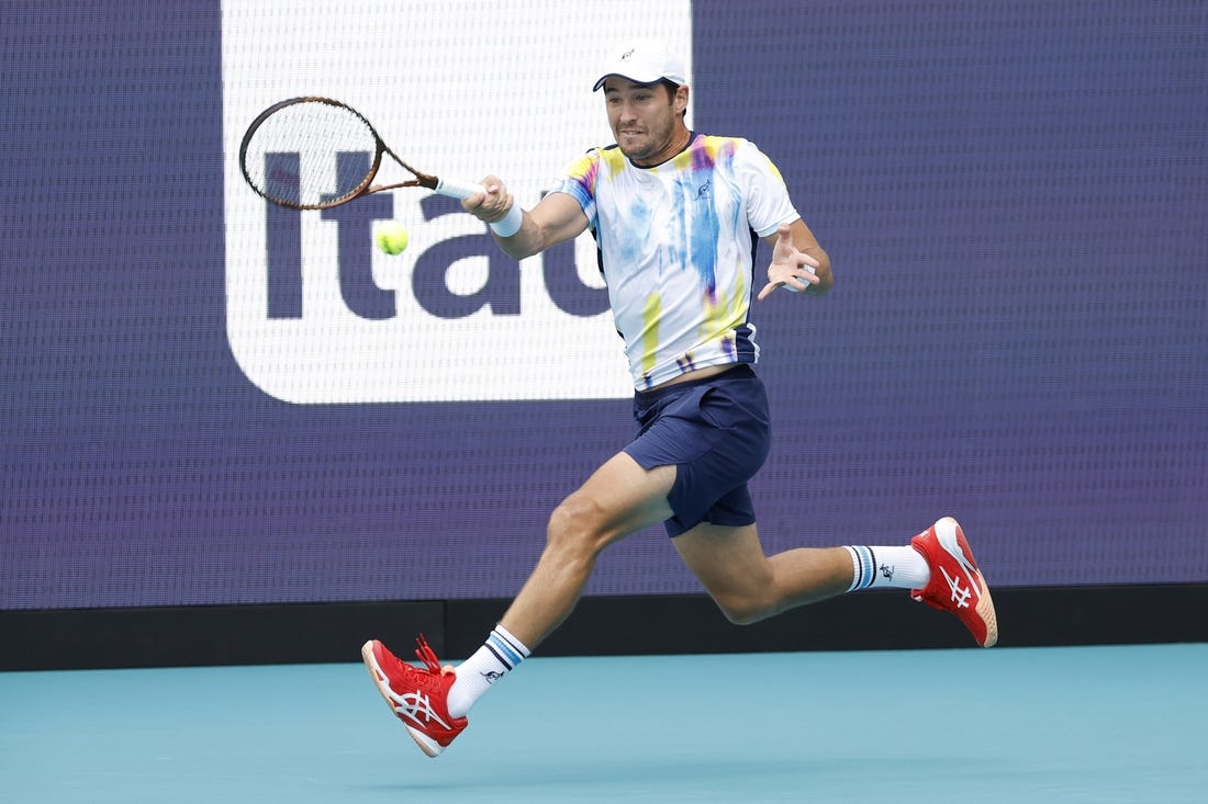 Mar 26, 2023; Miami, Florida, US; Dusan Lajovic (SRB) hits a forehand against Carlos Alcaraz (ESP) (not pictured) on day seven of the Miami Open at Hard Rock Stadium. Mandatory Credit: Geoff Burke-USA TODAY Sports