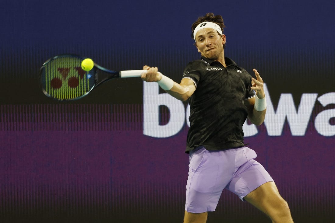 Mar 26, 2023; Miami, Florida, US; Casper Ruud (NOR) hits a forehand against Botic van de Zandschulp (NED) (not pictured) on day seven of the Miami Open at Hard Rock Stadium. Mandatory Credit: Geoff Burke-USA TODAY Sports