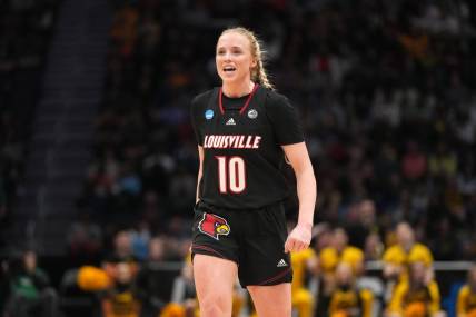 Mar 26, 2023; Seattle, WA, USA; Louisville Cardinals guard Hailey Van Lith (10) reacts against the Iowa Hawkeyes in the first half at Climate Pledge Arena. Mandatory Credit: Kirby Lee-USA TODAY Sports