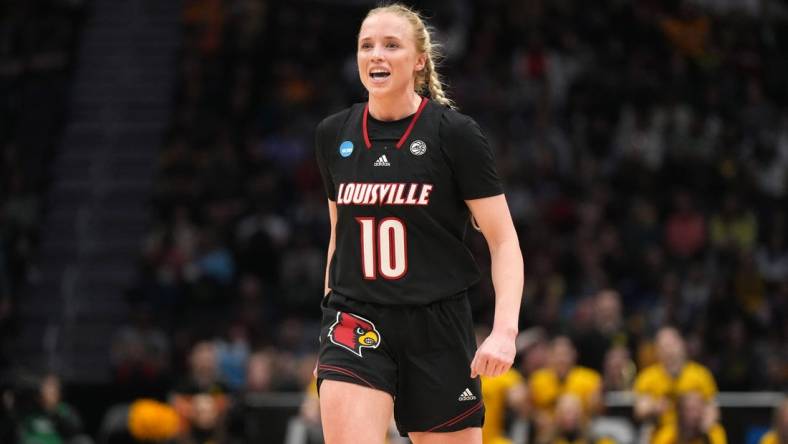 Mar 26, 2023; Seattle, WA, USA; Louisville Cardinals guard Hailey Van Lith (10) reacts against the Iowa Hawkeyes in the first half at Climate Pledge Arena. Mandatory Credit: Kirby Lee-USA TODAY Sports