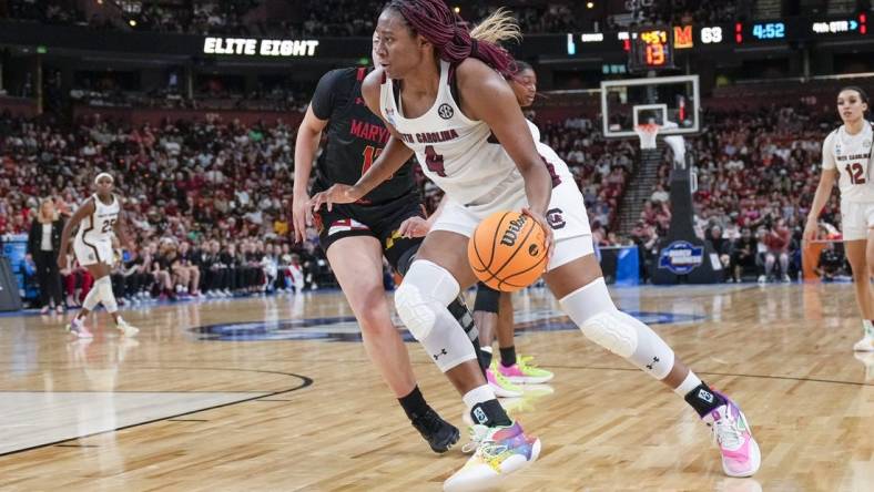 Mar 27, 2023; Greenville, SC, USA; South Carolina Gamecocks forward Aliyah Boston (4) drives to the basket against the Maryland Terrapins during the second half at the NCAA Women s Tournament at Bon Secours Wellness Arena. Mandatory Credit: Jim Dedmon-USA TODAY Sports