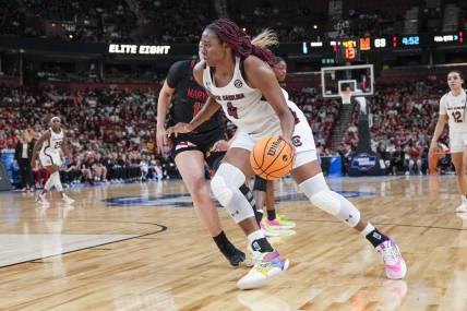 Mar 27, 2023; Greenville, SC, USA; South Carolina Gamecocks forward Aliyah Boston (4) drives to the basket against the Maryland Terrapins during the second half at the NCAA Women s Tournament at Bon Secours Wellness Arena. Mandatory Credit: Jim Dedmon-USA TODAY Sports