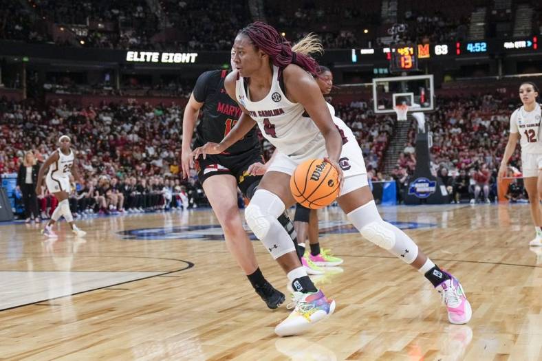 Mar 27, 2023; Greenville, SC, USA; South Carolina Gamecocks forward Aliyah Boston (4) drives to the basket against the Maryland Terrapins during the second half at the NCAA Women s Tournament at Bon Secours Wellness Arena. Mandatory Credit: Jim Dedmon-USA TODAY Sports