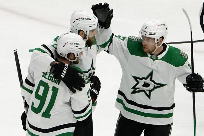 Mar 28, 2023; Chicago, Illinois, USA; Dallas Stars center Tyler Seguin (91) celebrates his goal against the Chicago Blackhawks with teammates during the first period at United Center. Mandatory Credit: David Banks-USA TODAY Sports