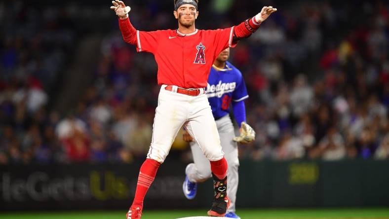 Mar 28, 2023; Anaheim, California, USA; Los Angeles Angels shortstop Zach Neto (94) reacts after reaching second on a double against the Los Angeles Dodgers during the seventh inning at Angel Stadium. Mandatory Credit: Gary A. Vasquez-USA TODAY Sports