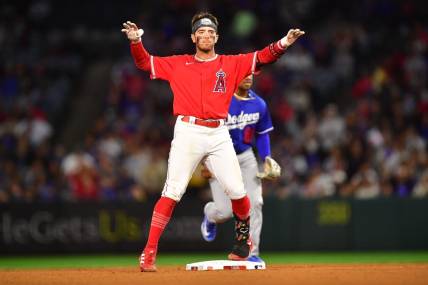 Mar 28, 2023; Anaheim, California, USA; Los Angeles Angels shortstop Zach Neto (94) reacts after reaching second on a double against the Los Angeles Dodgers during the seventh inning at Angel Stadium. Mandatory Credit: Gary A. Vasquez-USA TODAY Sports