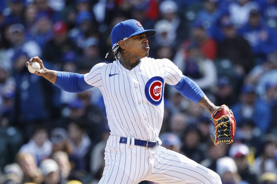 Mar 30, 2023; Chicago, Illinois, USA; Chicago Cubs starting pitcher Marcus Stroman (0) delivers against the Milwaukee Brewers during the first inning at Wrigley Field. Mandatory Credit: Kamil Krzaczynski-USA TODAY Sports