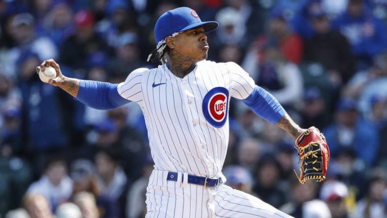 Mar 30, 2023; Chicago, Illinois, USA; Chicago Cubs starting pitcher Marcus Stroman (0) delivers against the Milwaukee Brewers during the first inning at Wrigley Field. Mandatory Credit: Kamil Krzaczynski-USA TODAY Sports