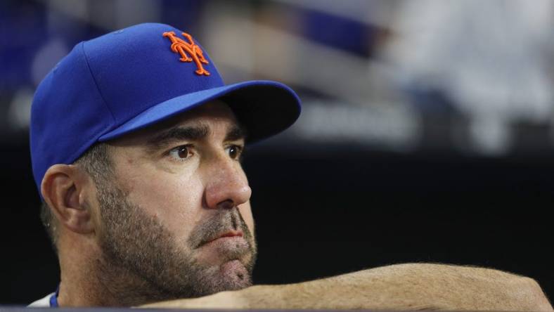 Mar 30, 2023; Miami, Florida, USA; New York Mets starting pitcher Justin Verlander (35) looks on from the dugout prior to the game against the Miami Marlins at loanDepot Park. Mandatory Credit: Sam Navarro-USA TODAY Sports