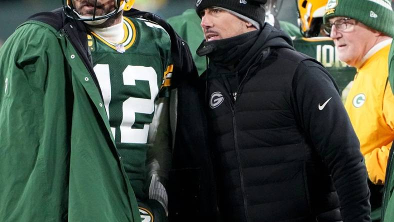 Green Bay Packers quarterback Aaron Rodgers (12) talks with head coach Matt LaFleur during the fourth quarter of their game Monday, December 19, 2022 at Lambeau Field in Green Bay, Wis. The Green Bay Packers beat the Los Angeles Rams 24-12.

Packers19 5