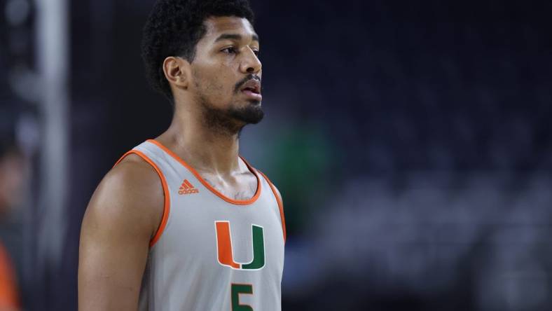 Mar 31, 2023; Houston, TX, USA; Miami (Fl) Hurricanes guard Harlond Beverly (5) looks on during a practice session the day before the Final Four of the 2023 NCAA Tournament at NRG Stadium. Mandatory Credit: Troy Taormina-USA TODAY Sports