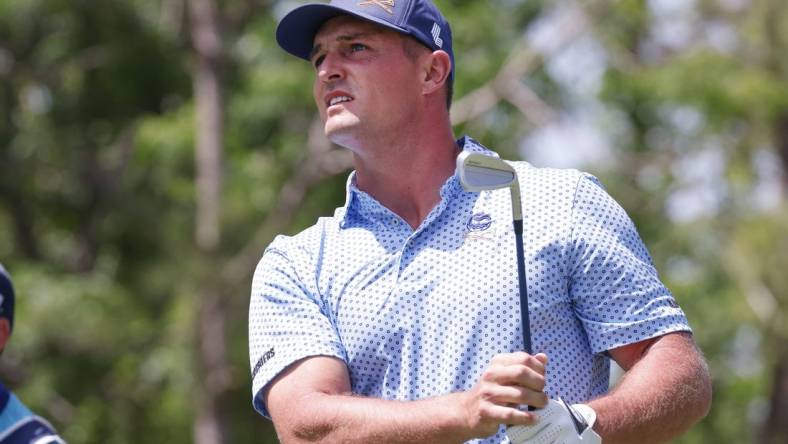 Mar 31, 2023; Orlando, Florida, USA; Bryson DeChambeau of the Crushers plays his shot from the seventh tee during the first round of a LIV Golf event at Orange County National. Mandatory Credit: Reinhold Matay-USA TODAY Sports