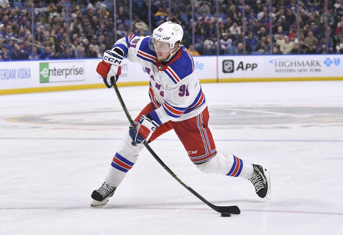 Mar 31, 2023; Buffalo, New York, USA; New York Rangers right wing Vladimir Tarasenko (91) takes a slap shot on goal against the Buffalo Sabres in the third period at KeyBank Center. Mandatory Credit: Mark Konezny-USA TODAY Sports