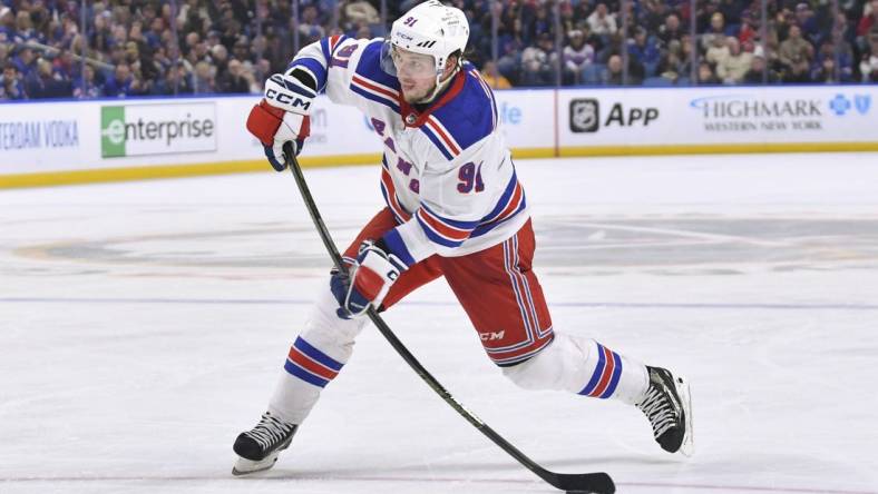 Mar 31, 2023; Buffalo, New York, USA; New York Rangers right wing Vladimir Tarasenko (91) takes a slap shot on goal against the Buffalo Sabres in the third period at KeyBank Center. Mandatory Credit: Mark Konezny-USA TODAY Sports