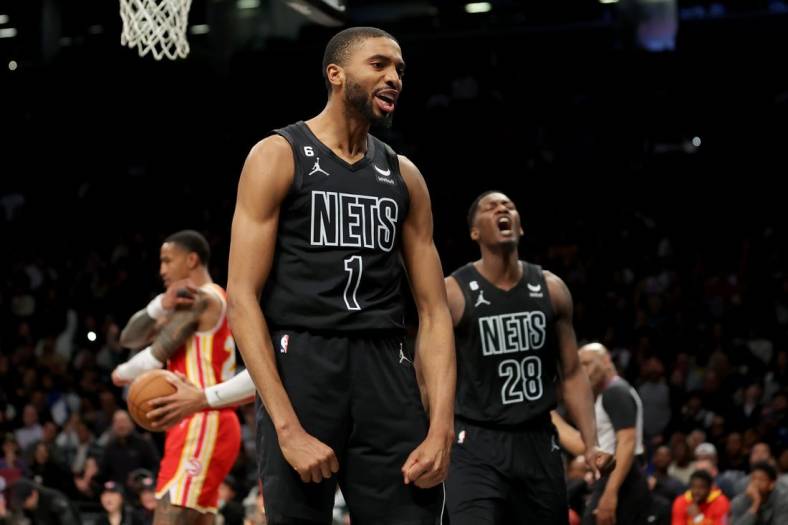 Mar 31, 2023; Brooklyn, New York, USA; Brooklyn Nets forward Mikal Bridges (1) reacts after a basket against the Atlanta Hawks during the fourth quarter at Barclays Center. Mandatory Credit: Brad Penner-USA TODAY Sports