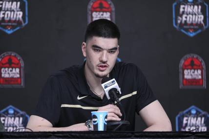 Apr 1, 2023; Houston, TX, USA; Purdue center Zach Edey speaks at a press conference after being announced as the Oscar Robertson player of the year at NRG Stadium. Mandatory Credit: Troy Taormina-USA TODAY Sports
