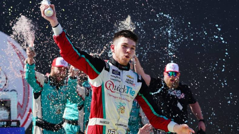 Apr 1, 2023; Richmond, Virginia, USA; Xfinity Series driver Chandler Smith (16) celebrates in victory lane after his win in the ToyotaCare 250 at Richmond Raceway. Mandatory Credit: John David Mercer-USA TODAY Sports