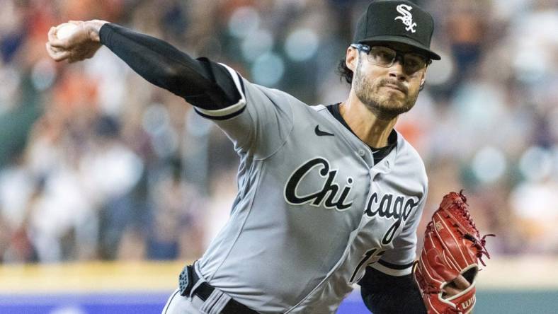 Apr 1, 2023; Houston, Texas, USA; Chicago White Sox relief pitcher Joe Kelly (17) pitches against the Houston Astros in the sixth inning at Minute Maid Park. Mandatory Credit: Thomas Shea-USA TODAY Sports