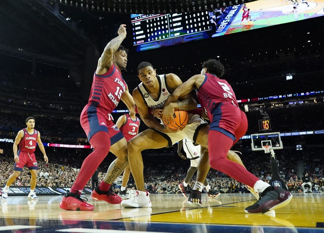 Apr 1, 2023; Houston, TX, USA; San Diego State Aztecs forward Keshad Johnson (0) battles for a rebound with Florida Atlantic Owls guard Alijah Martin (15) and Florida Atlantic Owls guard Nicholas Boyd (2) in the semifinals of the Final Four of the 2023 NCAA Tournament at NRG Stadium. Mandatory Credit: Robert Deutsch-USA TODAY Sports