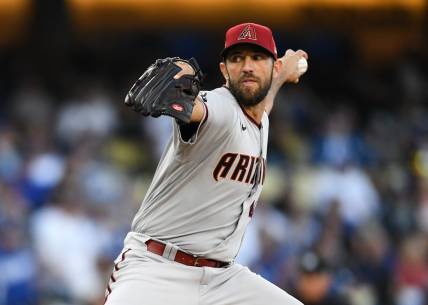 Apr 1, 2023; Los Angeles, California, USA; Arizona Diamondbacks starting pitcher Madison Bumgarner (40) throws a pitch against the Los Angeles Dodgers during the first inning at Dodger Stadium. Mandatory Credit: Jonathan Hui-USA TODAY Sports