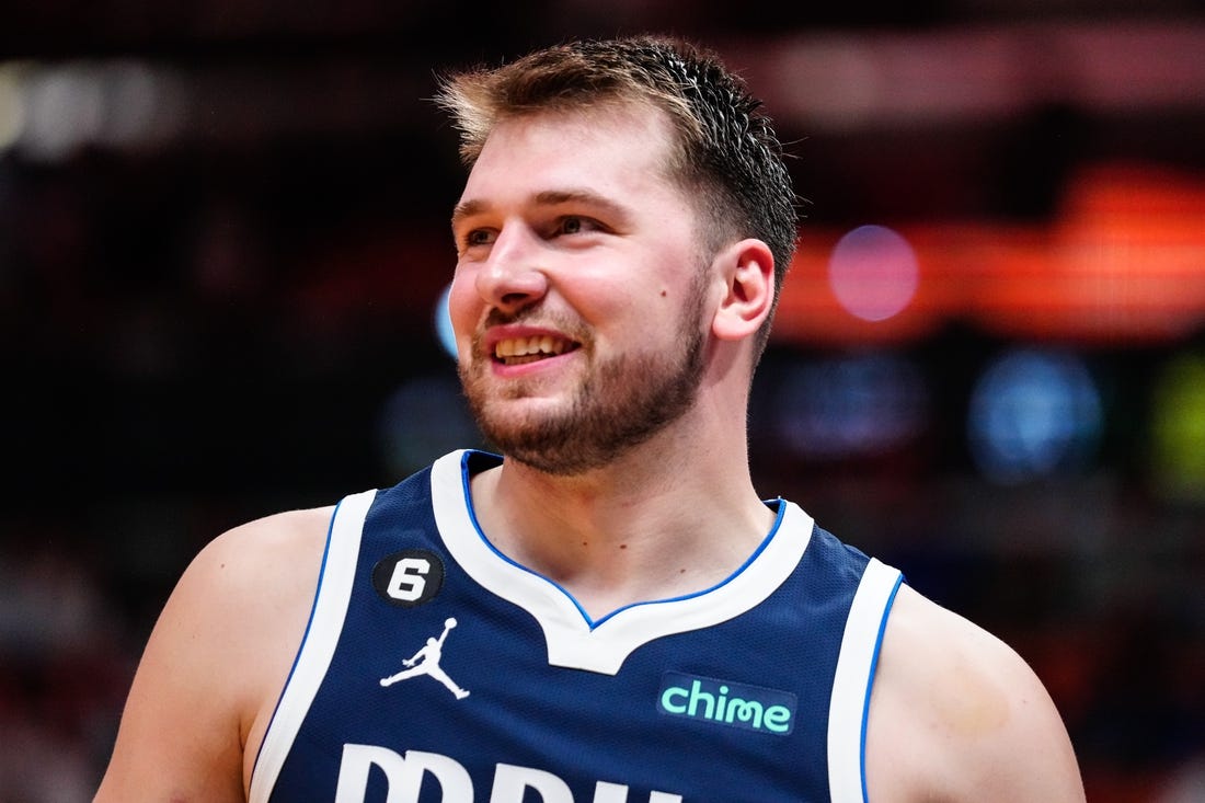 Apr 1, 2023; Miami, Florida, USA; Dallas Mavericks guard Luka Doncic (77) reacts to a foul against the Miami Heat during the third quarter at Miami-Dade Arena. Mandatory Credit: Rich Storry-USA TODAY Sports