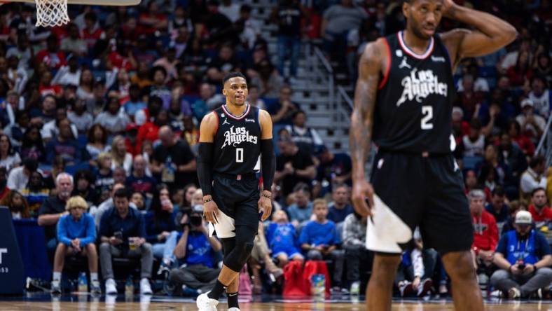 LA Clippers guard Russell Westbrook (0) could be missing forward Kawhi Leonard (2) again in Game 4 on Saturday. Mandatory Credit: Stephen Lew-USA TODAY Sports