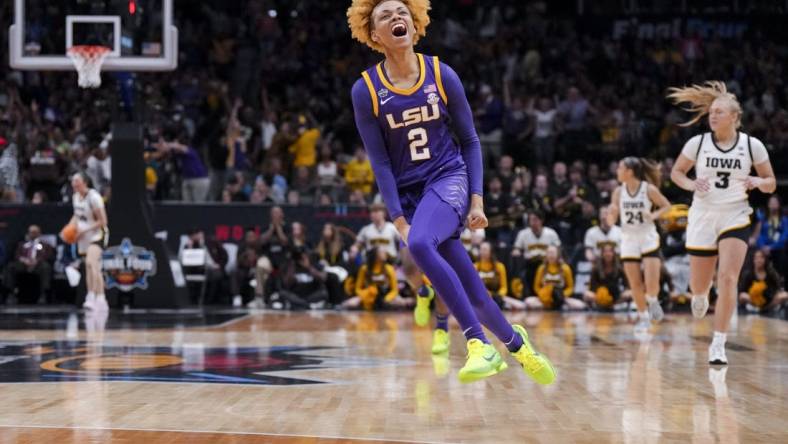 Apr 2, 2023; Dallas, TX, USA; LSU Lady Tigers guard Jasmine Carson (2) yells as she runs on the court in the game against the Iowa Hawkeyes in the first half during the final round of the Women's Final Four NCAA tournament at the American Airlines Center. Mandatory Credit: Kirby Lee-USA TODAY Sports