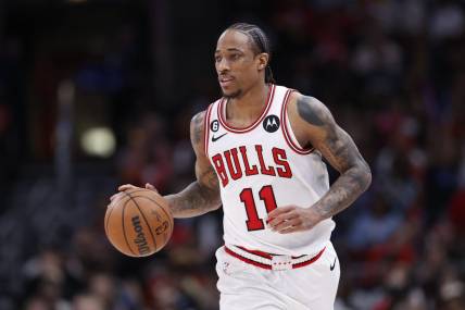 Apr 2, 2023; Chicago, Illinois, USA; Chicago Bulls forward DeMar DeRozan (11) brings the ball up court against the Memphis Grizzlies during the second half at United Center. Mandatory Credit: Kamil Krzaczynski-USA TODAY Sports