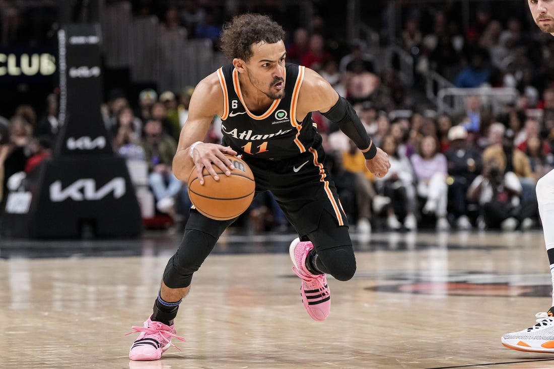 Apr 2, 2023; Atlanta, Georgia, USA; Atlanta Hawks guard Trae Young (11) dribbles against the Dallas Mavericks during the second half at State Farm Arena. Mandatory Credit: Dale Zanine-USA TODAY Sports